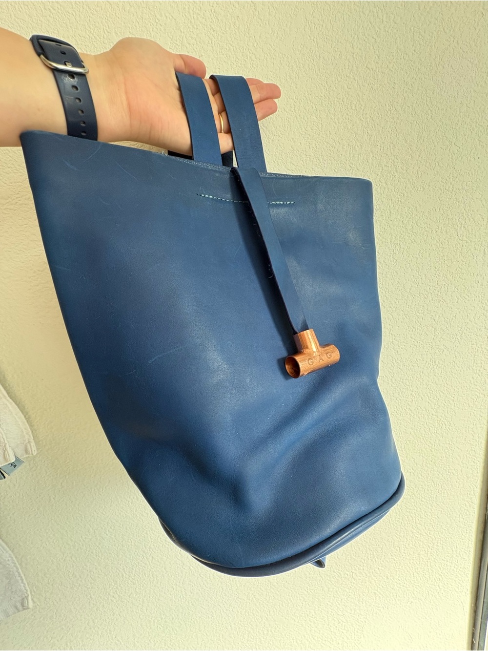 Structured Navy Leather Tote Backpack with Copper Accent